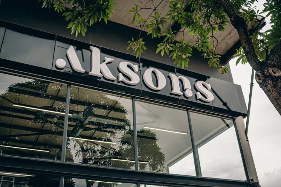 A logotype applied as signage on a glass studio door.